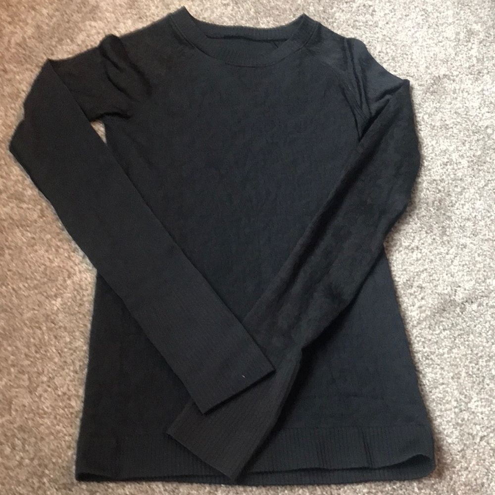 Black LuLu Lemon athletic shirt.